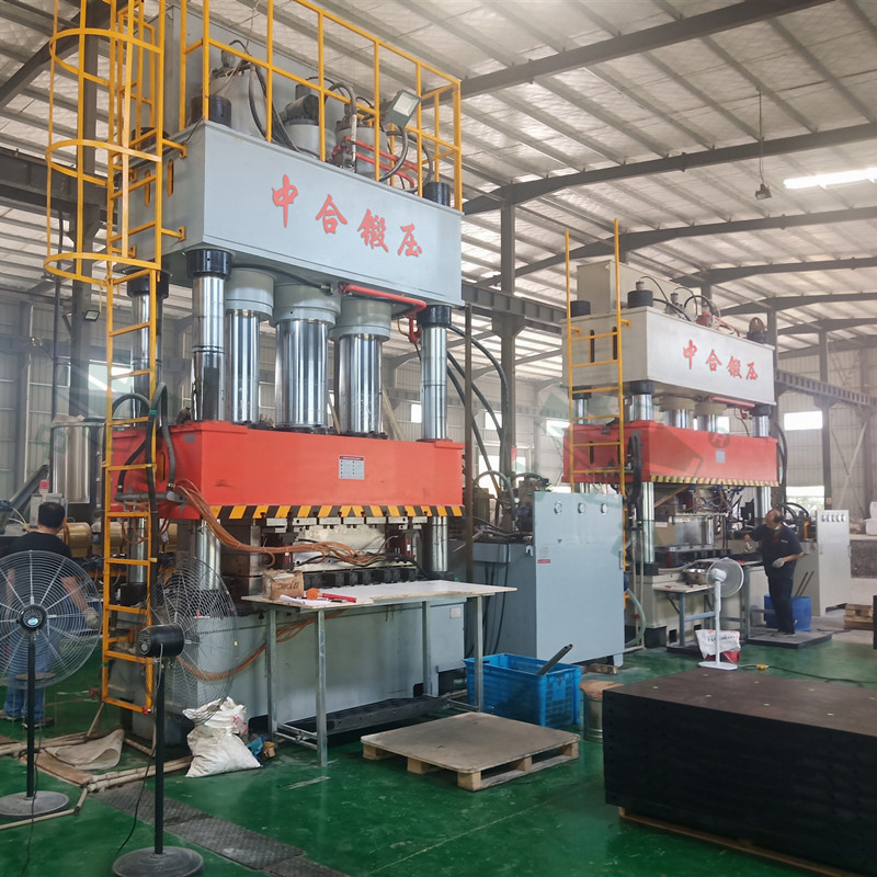 復(fù)合建筑模板生產(chǎn)設(shè)備_800噸液壓機(jī)_復(fù)合材料模壓成型(圖3) 復(fù)合建筑模板生產(chǎn)設(shè)備_800噸液壓機(jī)_復(fù)合材料模壓成型(圖3)
